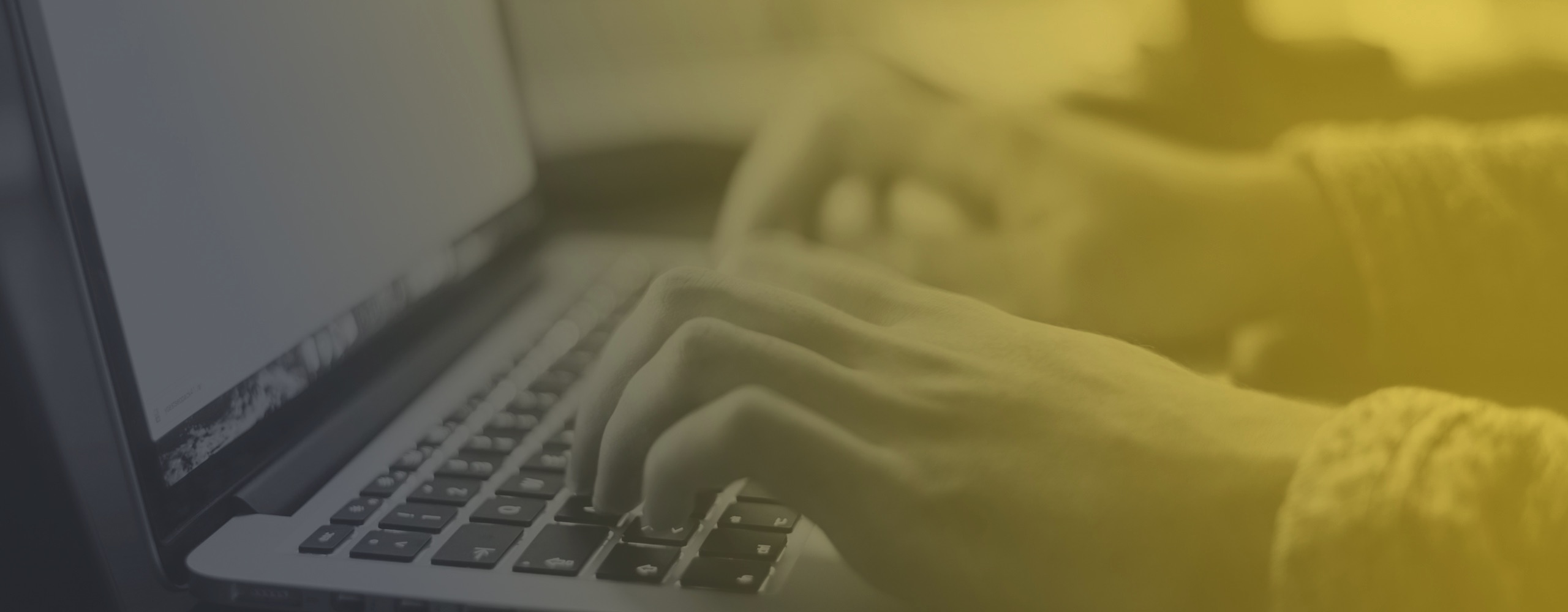 image of hands typing on a keyboard